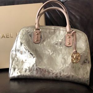 Michael Kors light gold monogrammed handbag